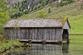 Boat wooden garage on alpine lake