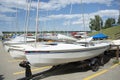 Boat yard with small sailing boats and kayaks Royalty Free Stock Photo