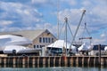 Boat yard in winter with shrink-wrapped boats to protect them from snow and rain Royalty Free Stock Photo