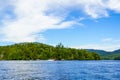 Boaters enjoy summer day on Lake Placid in New York State`s Adirondack Mountains Royalty Free Stock Photo