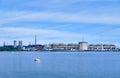 Boaters on Lake Ontario enjoy a summer day in front of the Pickering Nuclear Power Generating station