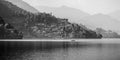 Boaters on the Phewa Lake, with the foothills of the Annapurna mountain range Royalty Free Stock Photo