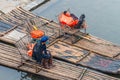 Boaters on their bamboo raft on the bank of the Li River Royalty Free Stock Photo