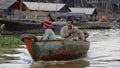 Boaters at Tonie Sap, Cambodia Royalty Free Stock Photo