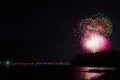 Fireworks over Lake Wallenpaupack in Hawley, PA for the 4th of July being watched by boaters Royalty Free Stock Photo