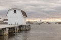 Boathouse on Dock at Sunset