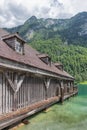 Boathouse German Konigssee with steep mountains and clear transparant water