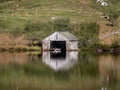 Boathouse by Pared y Cefn-hir mountain during autumn in the Snowdonia National Park, Dolgellau, Wales