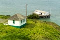 Boathouse on a pier next to small house Royalty Free Stock Photo