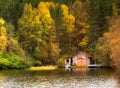 Boathouse on the shore of Loch Farr during autumn season in the Scottish Highlands