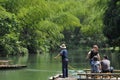 Boating in bamboo forest and lake Royalty Free Stock Photo