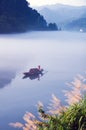 Boating and fishing in the lake Royalty Free Stock Photo