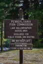 Boating and Fishing Sign by the Pennsylvania Fish Commission at Lake Wallenpaupack in the Poconos Royalty Free Stock Photo