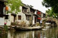 Boatman on Canal, Zhouzhuang, China