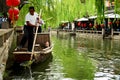 Boatman on Canal, Zhouzhuang, China