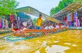The boatman in Damnoen Saduak floating market, Thailand