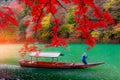 Boatman punting the boat at Katsura River