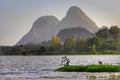 Boatman rowing at Tasoh Lake, Perlis, Malaysia Royalty Free Stock Photo