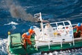 Boatman working on deck supply boat, crews operation on installation boat Royalty Free Stock Photo