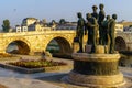 Boatmen of Thessaloniki Monument, and Stone Bridge, Skopje Royalty Free Stock Photo