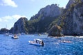 Boats of all sizes moored near the coastline of the island of Capri, Italy