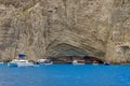 Ionian Sea. Boats anchored in Navagio Bay - Zakynthos Island, landmark attraction in Greece. Seascape Royalty Free Stock Photo