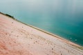 Boats anchored at the bottom of the Sleeping Bear Dunes on Lake Michigan Royalty Free Stock Photo