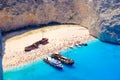 Boats anchored at Navagio beach, Zakynthos. Famous shipwreck on