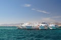 Boats anchored on Red Sea coral reef Royalty Free Stock Photo