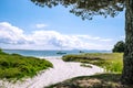 Boats anchored at a secluded sandy beach at Karikari Peninsula,