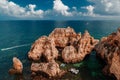 Boats anchored on a turquoise sea on the Portuguese Algarve coast. Royalty Free Stock Photo