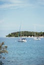 Boats in a bay with crystal clear water, Croatia