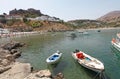 Boats, beach and Actopolis in Lindos Rhodes island, Greece Royalty Free Stock Photo