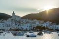 Boats in the beach and houses of the village of Cadaques, Spain