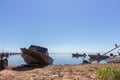 Boats on the beach. Nautical vessel. Fishing boat in dock. Marine transport. Sea bay landscape. Seascape background. Royalty Free Stock Photo