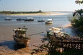 Boats on the beach near the river mouth Royalty Free Stock Photo