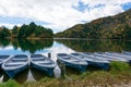 Boats on blue lake and blue sky nature scenic view, panorama Royalty Free Stock Photo