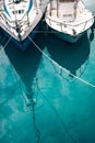 Boats bows on turquoise water