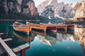 Boats on Braies lake in Dolomite mountains, Sudtirol, Italy. Nature park Fanes-Sennes-Prags, Dolomite, Italy, Europe. Generative