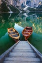 Boats on the Braies Lake Pragser Wildsee in Dolomites mounta