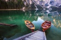 Boats on the Braies Lake Pragser Wildsee in Dolomites mounta