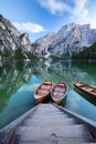 Boats on the Braies Lake Pragser Wildsee in Dolomites mounta