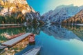 Boats on the Braies Lake Pragser Wildsee in Dolomites mountains, Sudtirol, Italy