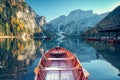 Boats on the Braies Lake  Pragser Wildsee  in Dolomites mountains, Sudtirol, Italy. Alps nature landscape Royalty Free Stock Photo