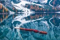 Boats on the Braies Lake  Pragser Wildsee  in Dolomites mountains, Sudtirol, Italy. Alps nature landscape Royalty Free Stock Photo