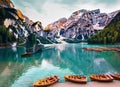 Boats on the Braies Lake Pragser Wildsee in Dolomites mountains Sudtirol Italy. Generated AI Royalty Free Stock Photo