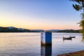 Boats on the calm sea under the pink and blue sky Royalty Free Stock Photo