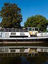 Boats on a canal quiet sunny day in summer