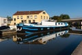 Boats on a canal quiet sunny day in summer