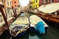 Boats on canal in Venice